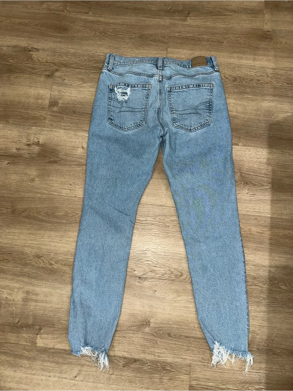 American Eagle Outfitters Light Blue Boyfriend Jeans with Distressed Hem